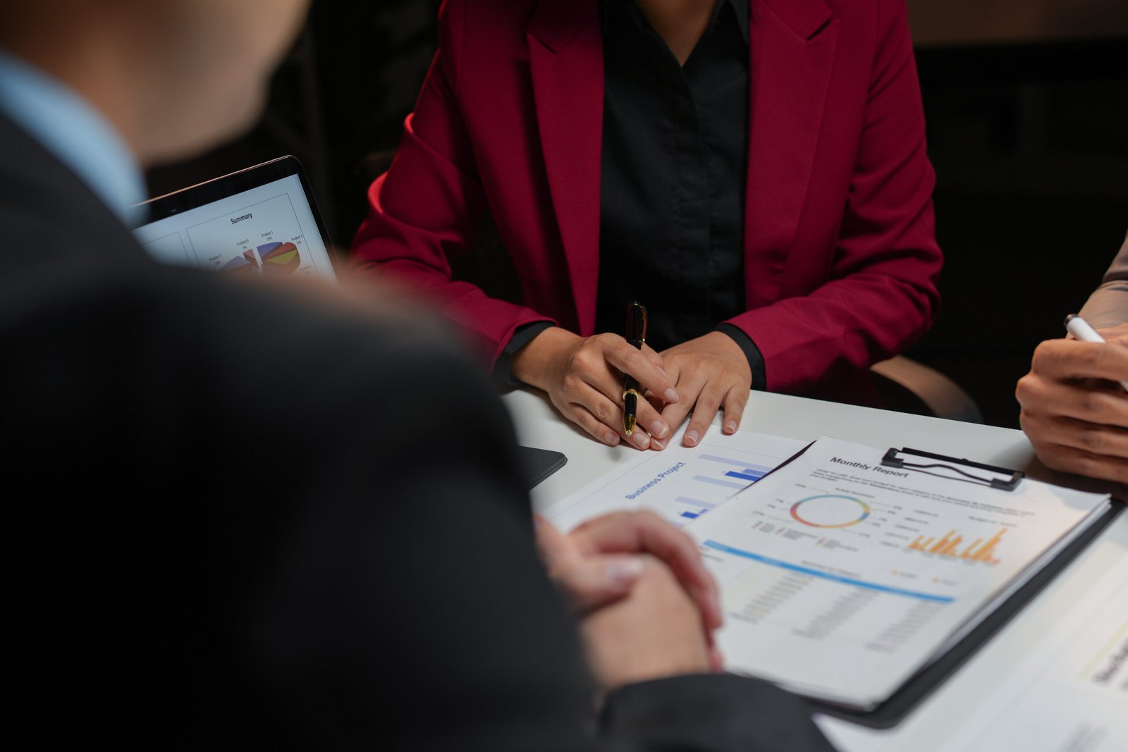 Business team analyzing financial data using graphs and charts